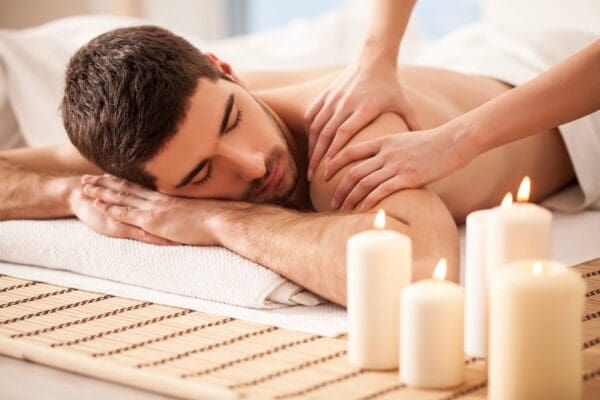 A man getting a massage on his back